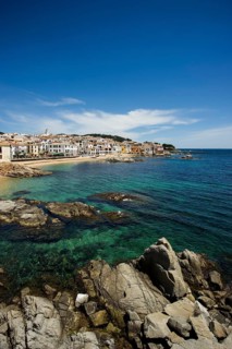 Village with a sandy beach on the sea