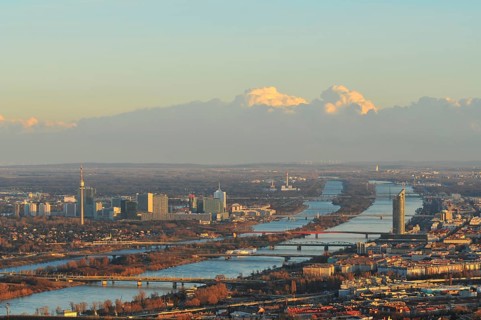 The city and the New Danube river at dusk