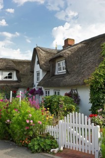 Thatched house with a cottage garden