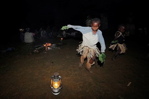 Pygmies of the Bakola people celebrating with song and dance