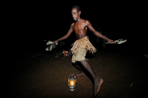 Pygmies of the Bakola people celebrating with song and dance