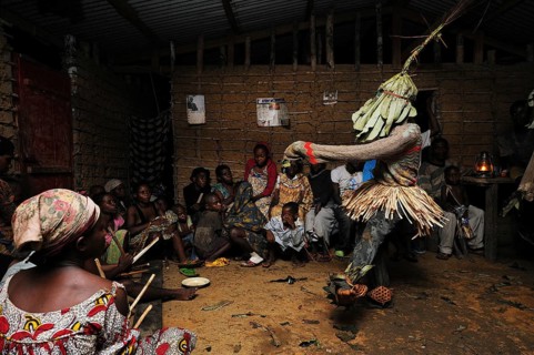 Pygmies of the Bakola people celebrating with song and dance