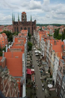Overview of Mariacka Street or Ulica Mariacka with the historic patrician houses and St. Mary's Church