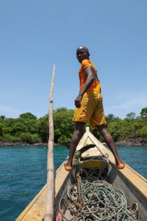 Boatsman looking for a suitable place to dock