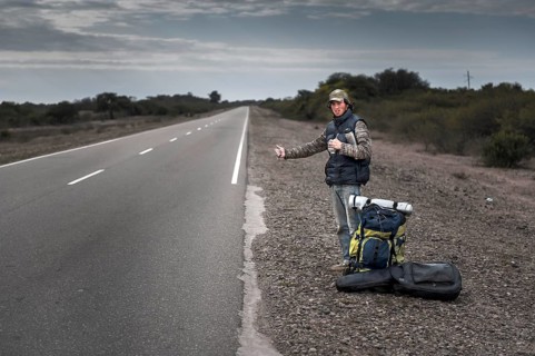Hitchhiker standing by the roadside