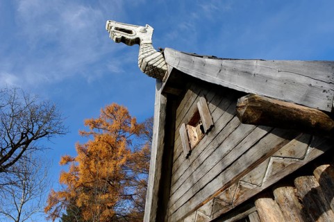 Dragon head as an ornament on a wooden hut