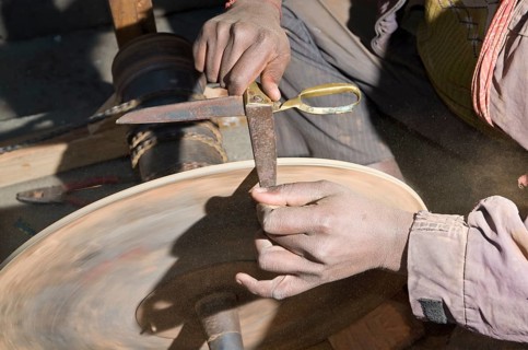 Knife grinder at work