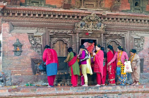 Women queuing to make offerings at a temple on Patan Durbar Square