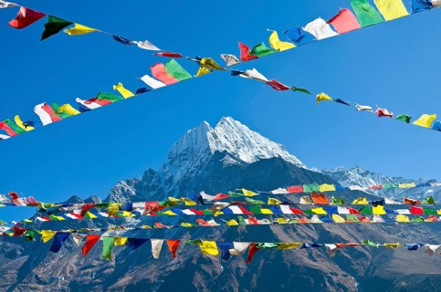 Buddhist prayer flags in front of Kangtega Mountain above Namche Bazar (3.440 m)