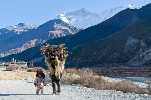 Woman walking with a small child