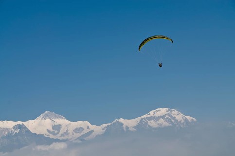 Paraglider sailing through the air