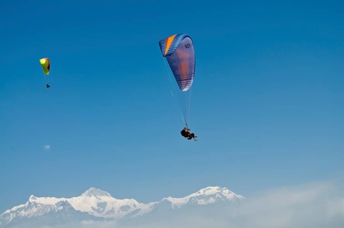 Paraglider sailing through the air