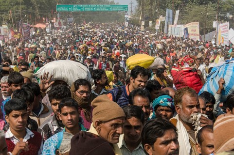 Crowds of people arriving at Kumbha Mela grounds