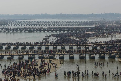 Many pontoon bridges crossing the river Ganges at the Kumbha Mela grounds