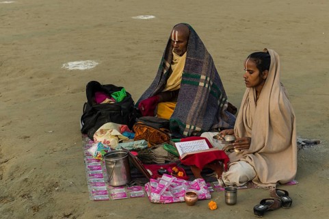 Priest and his daughter meditating