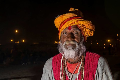 Portrait of a male pilgrim at night at the Sangam