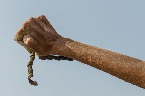 Crippled hand of a Shiva sadhu from Juna Akhara