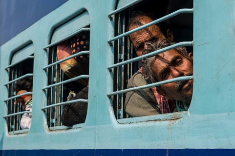 A train full of pilgrims at the railway station