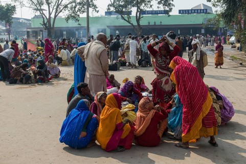 Crowds of people waiting for delayed trains all over the railway station