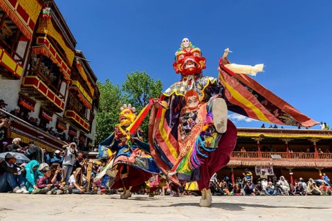 Monks performing ritual mask dance