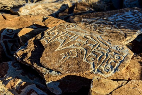 Mani stone with mantra 'Om Mani Padme Hum'
