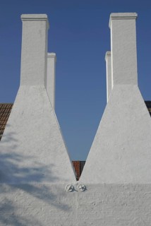 Four chimneys of a Bornholm herring smokehouse