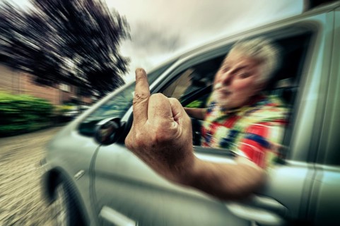 Car driver giving the finger