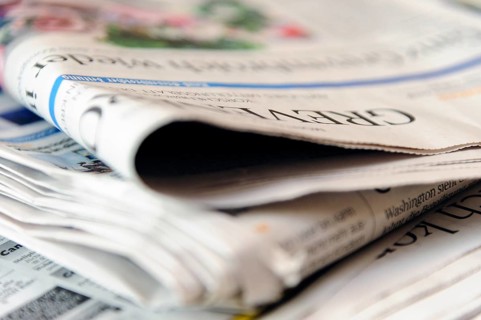 Folded newspapers