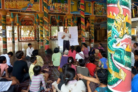 Meeting with village residents organized by a charity in the local pagoda to get together to discuss problems and potentials of the water supply in the community