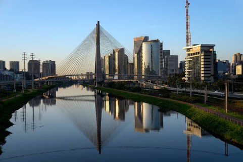 Modern skyscrapers and the Octavio Frias de Oliveira bridge over the Rio Pinheiros River