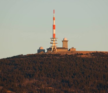 Summit plateau of Brocken Mountain with an antenna mast and Brockenhaus