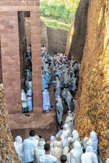 Pilgrims wearing a traditional white shawl attending a ceremony at the Bete Medhane Alem Church