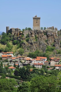 Castle of Polignac on a basalt rock above the village