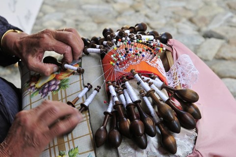 Old woman making lace