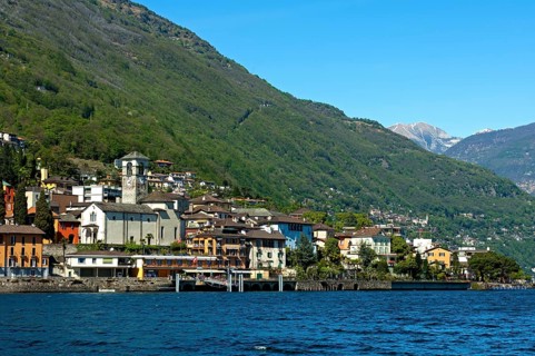 Lake view of Brissago with the Parish Church of Saints Peter and Paul on Lake Maggiore