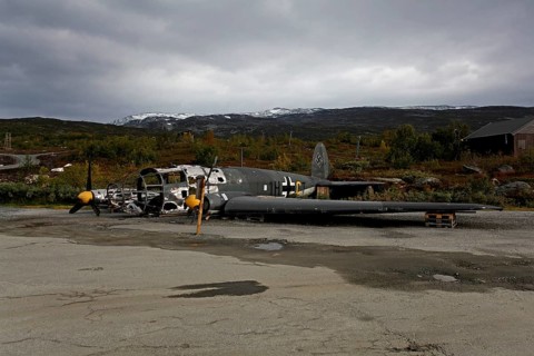 Old destroyed Nazi aircraft by the roadside