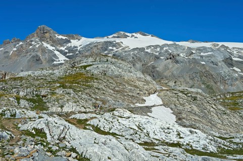 Hikers in the rocky terrain below the summit of Wildhorn Mountain
