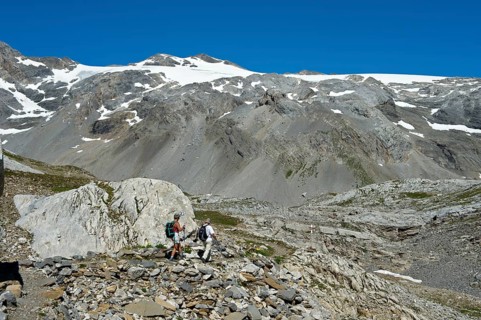 Hikers in the rocky terrain below the summit of Wildhorn Mountain