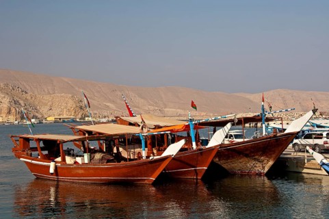 Three dhows are ready for excursions in the port of al-Khasab or al-Chasab