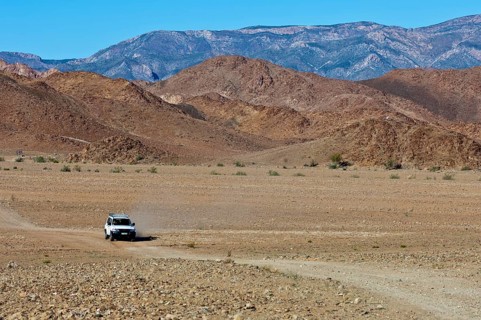 Mitsubishi SUV on a dirt road