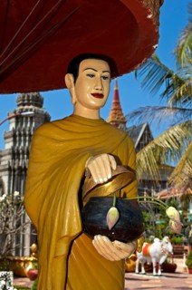 Statue of a mendicant monk at Wat Preah Prohm Rath temple
