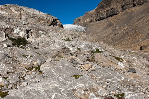 Glacial landscape with rocks carved by Tsanfleuron Glacier