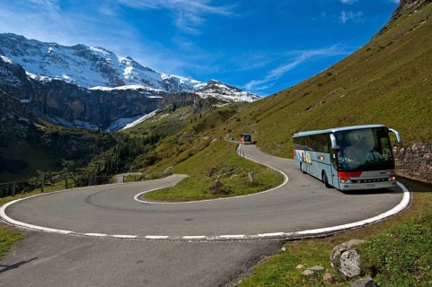Coach in a hairpin curve