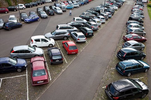 Car park with many parked cars