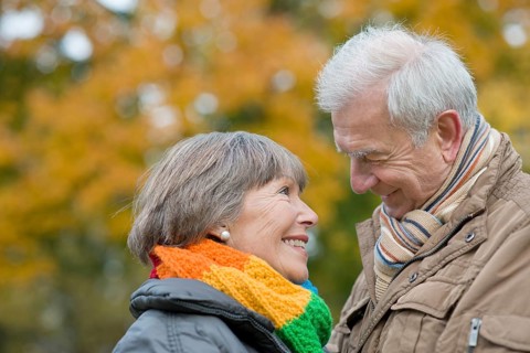 Senior couple smiling at each other