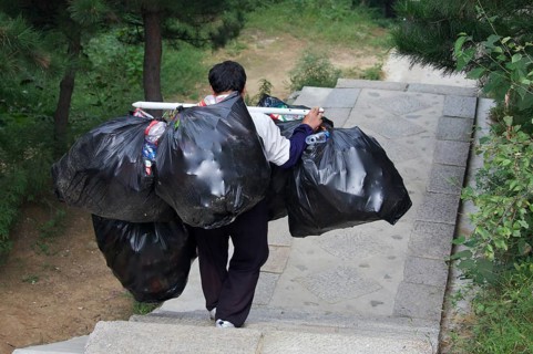 Garbage collector at the Great Wall of China