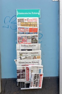 Magazine rack with German and Turkish newspapers