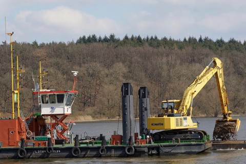 The working vessel 'Aegir' carrying a mobile backhoe