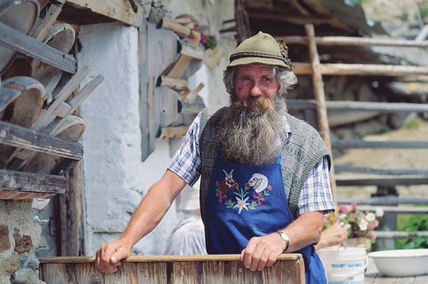 Man with a beard at Tallneralm alp at Mt Hirzer