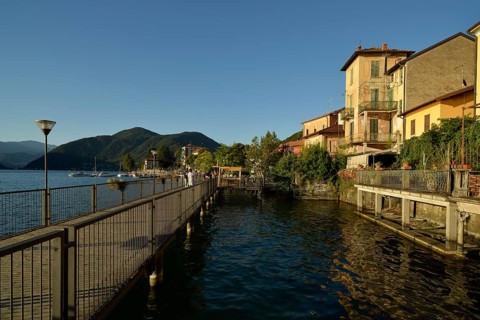 Promenade of Porto Ceresio on Lake Lugano or Lago di Lugano